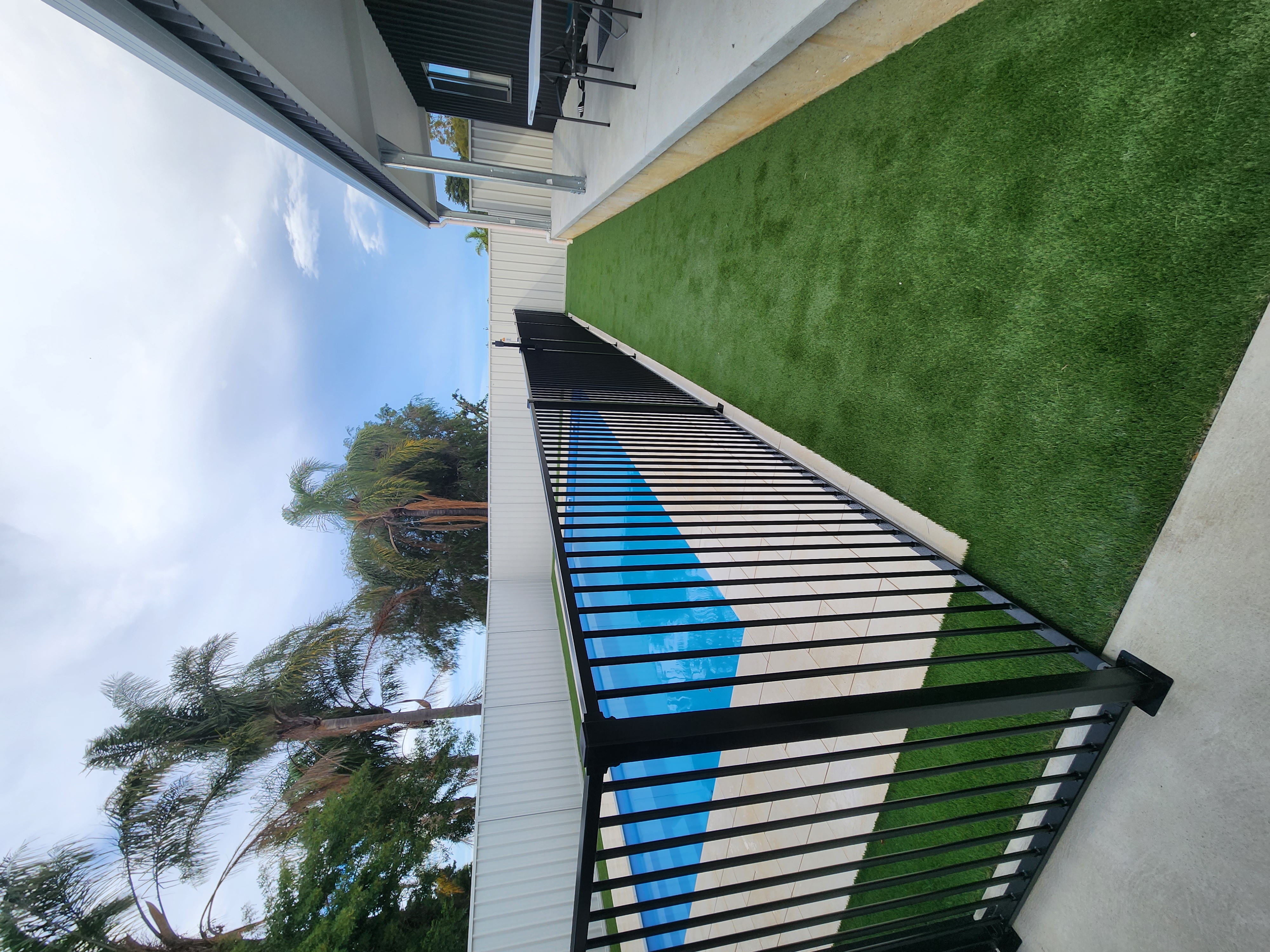 Custom tubular aluminium pool fence designed and installed by Secure Fit Fencing, Perth WA