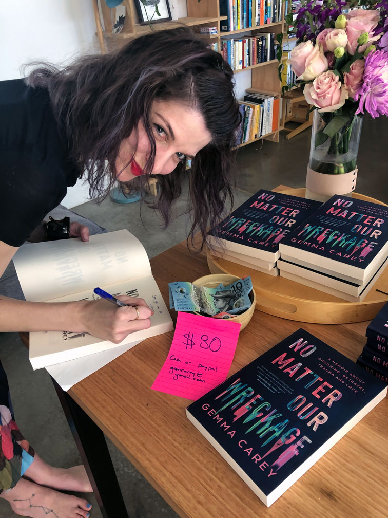 Gemma Carey (RIP) signing copies of her memoir, No Matter Our Wreckage (photo by Ben O’Mara).
