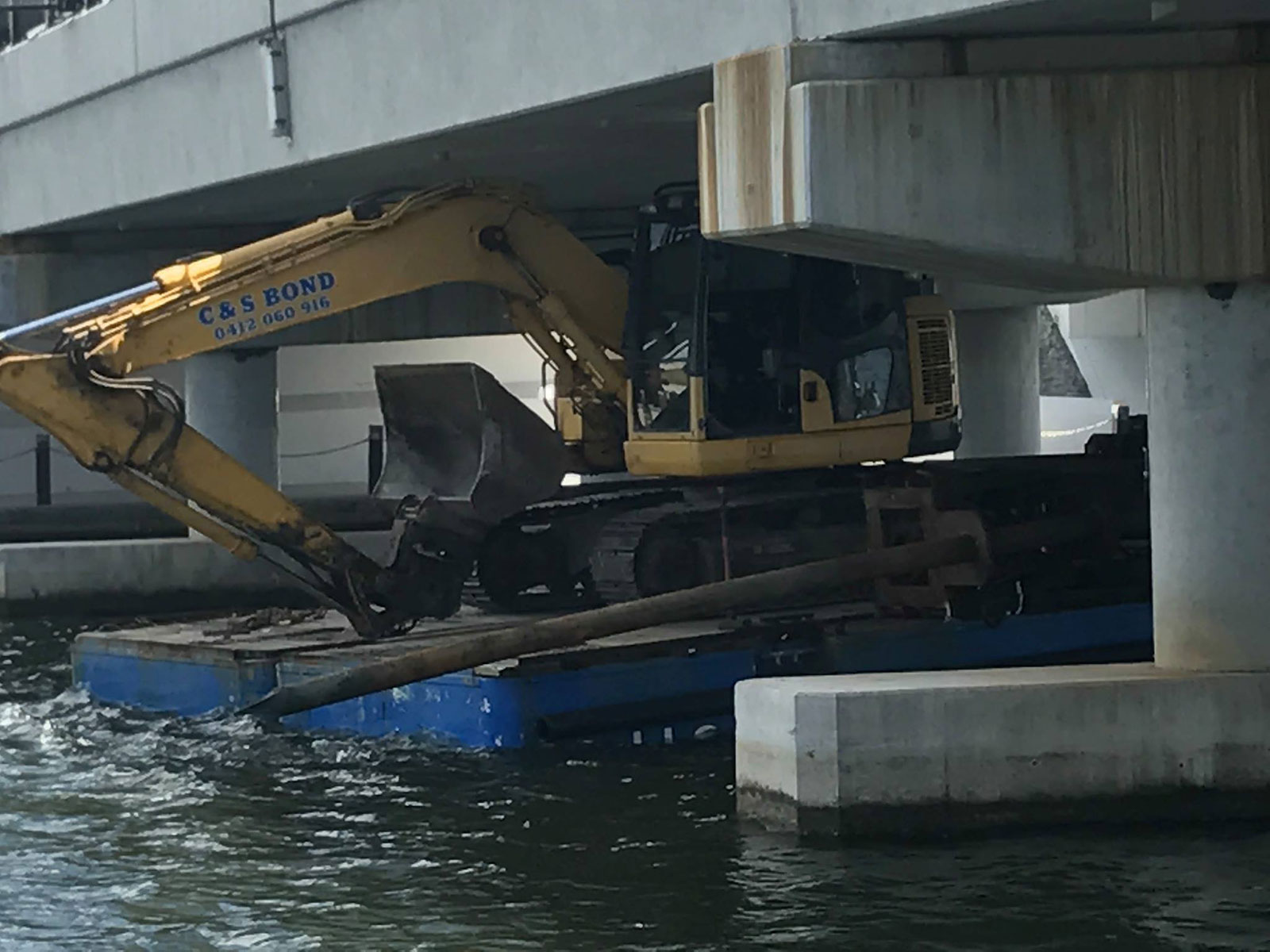 C & S Bond Earthmoving Excavator Hire on Barge for specialised project
